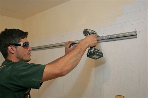 hanging ikea cabinets on steel studs|how to hang cabinets on studs.